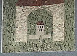 Mosaik von Torbogen und Haus an Außenfassade